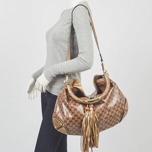 100% Authentic Gucci Indy Babouska Gold Monogram Bag